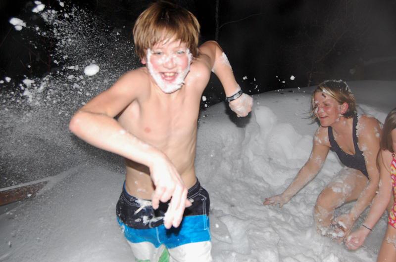 Kids having a snow fight